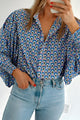 Surprised shirt buttoned with frowned and abstract blue sky