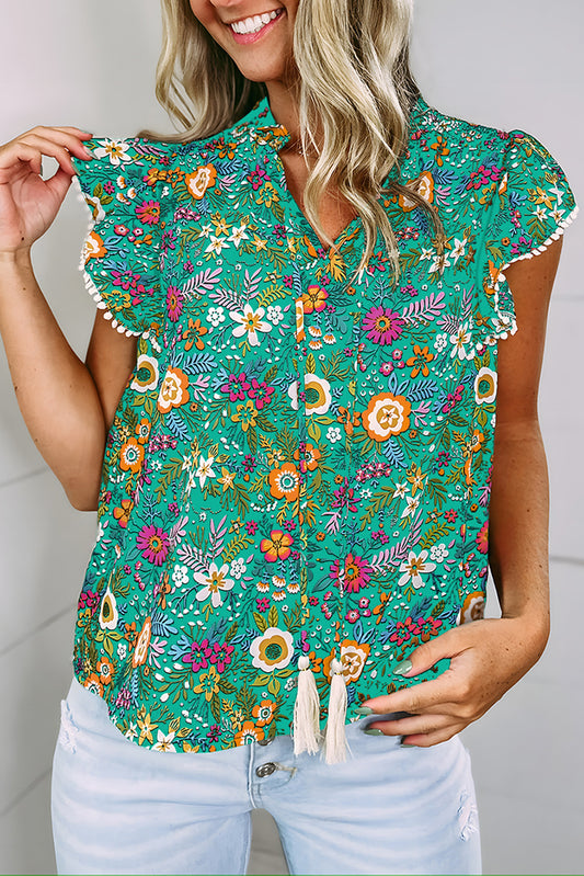 Blouse florale tropicale à manches flottantes et bordure en dentelle verte