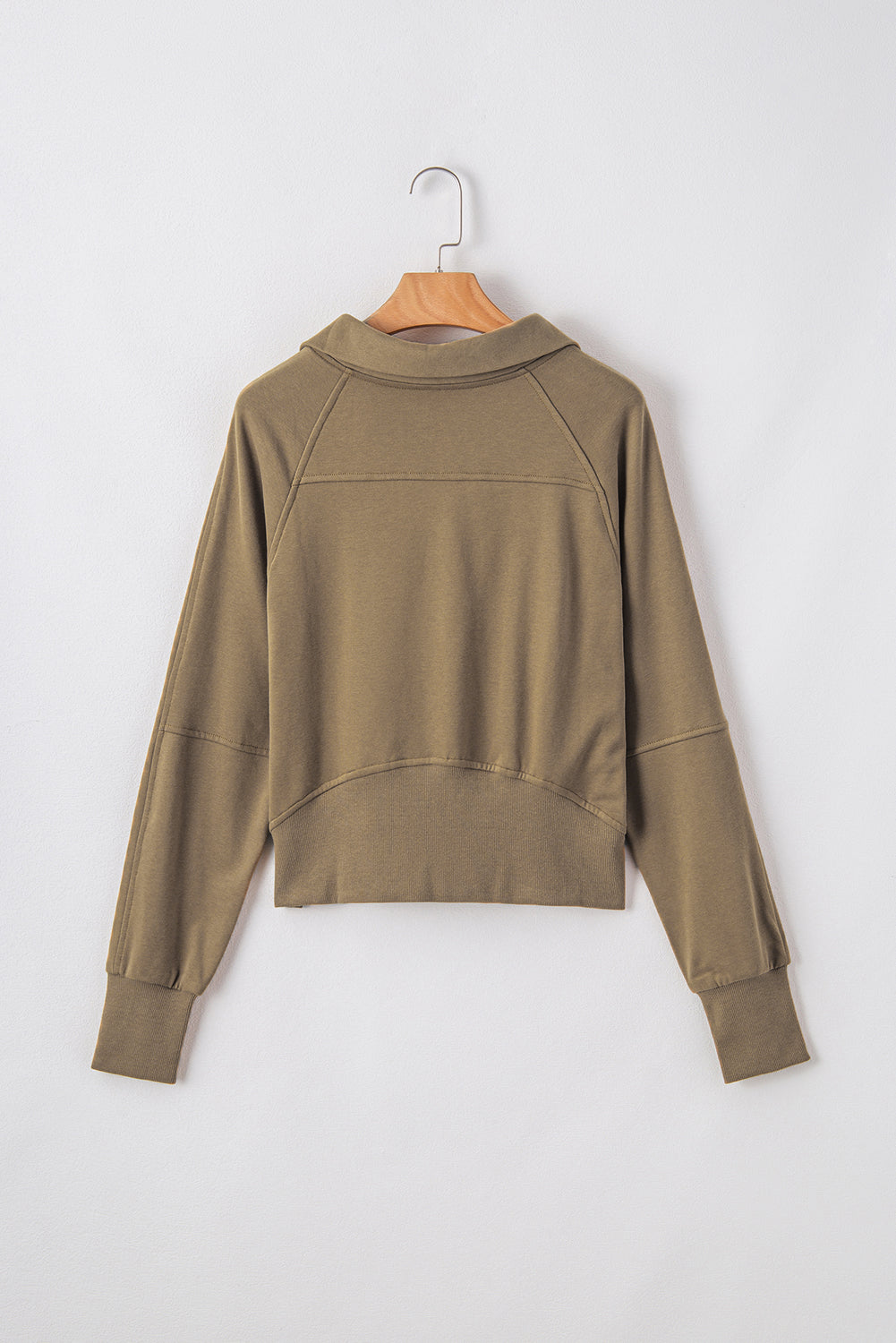 Brown sweatshirt with stand-up collar and kangaroo pocket with quarter-turn zip