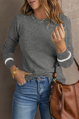 Medium gray sweater with long sleeves and round neck with ribbed border
