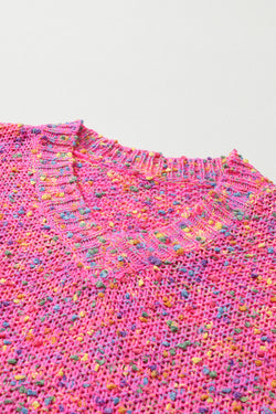 Decreeed sweater knitted with colored polka dots *