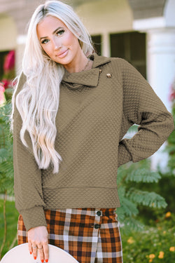 Apricot quilted sweatshirt with button-down neckline and stand-up collar